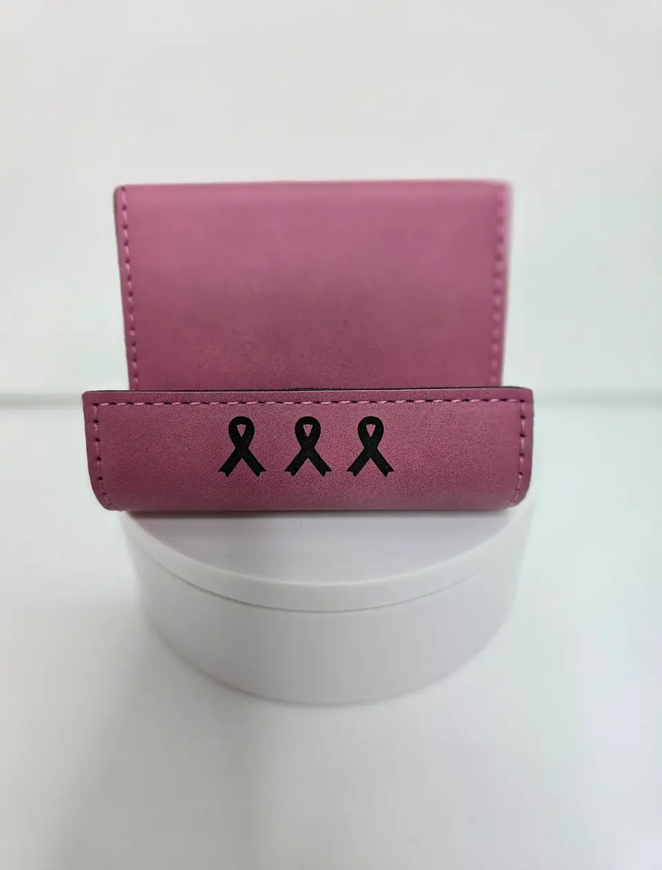 Small pink cardholder with ribbons