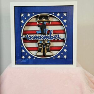 Patriotic artwork with "remember" text and stars.
