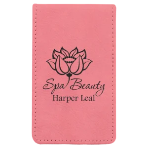 Pink spa beauty logo with lotus design.