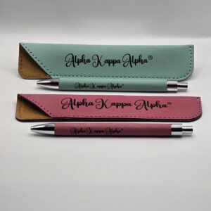 Two Alpha Kappa Alpha pens with matching cases