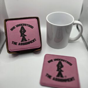 Pink 'She Understood the Assignment' coasters and mug